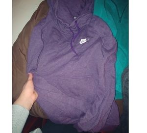 Purple cowl neck Nike hoodie with white logo.